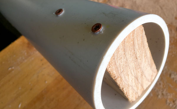 PVC pipe with wood studs in the end