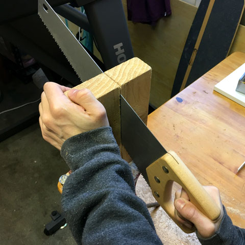 Cutting a piece of wood vertically